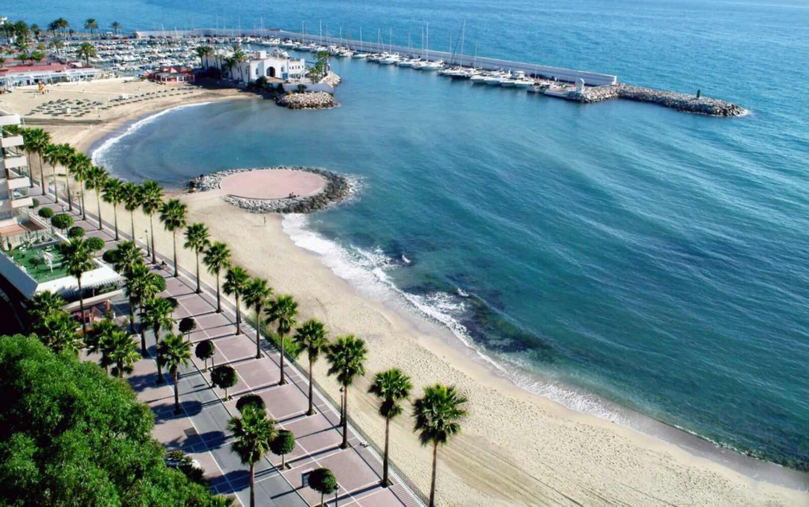 Playa del Faro and Marbella's marina promenade