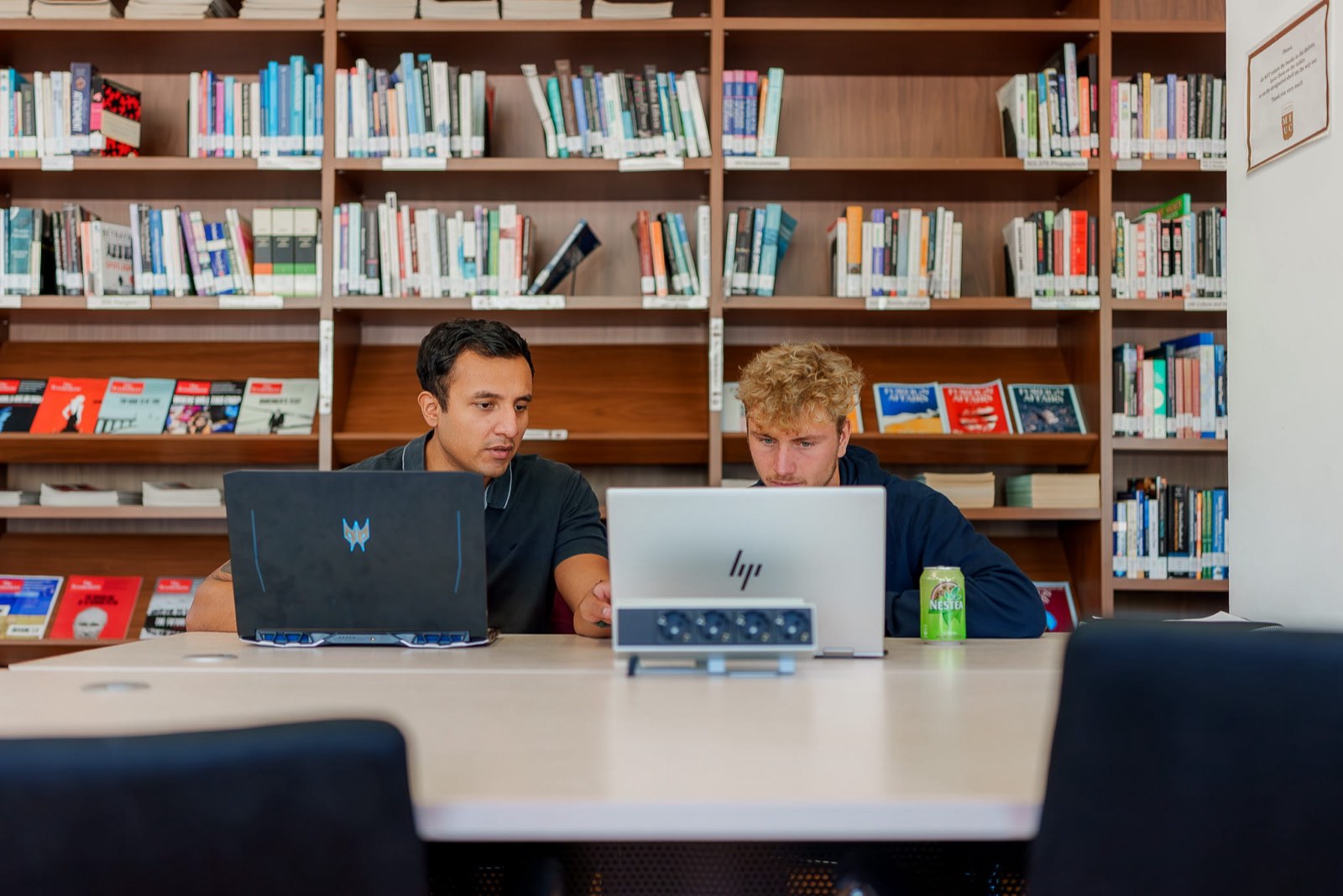 Students working in the library at Marbella International University Centre